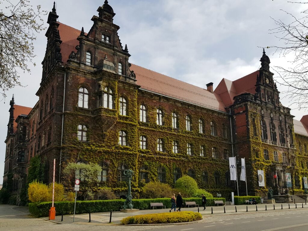 a large building with many windows and a clock tower